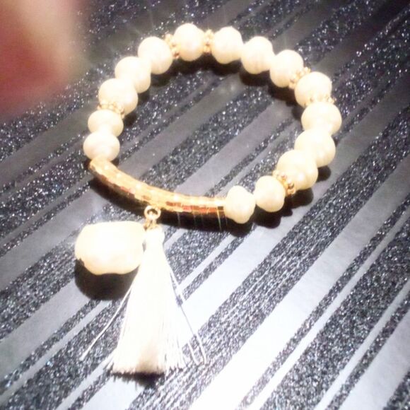 Gold Tone and Tassel Accented White Chunky Faux Pearl Stretch Bracelet - Picture 2 of 6